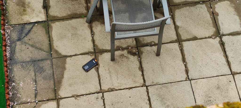 Dogee S59 Pro Phone On Concrete