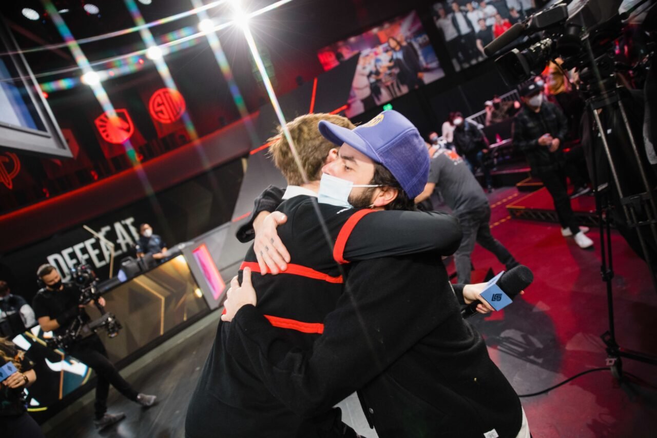 100 Thieves CEO Nadeshot and jungler Closer hugging on stage