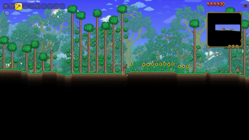 Gathering wood with an axe in Terraria