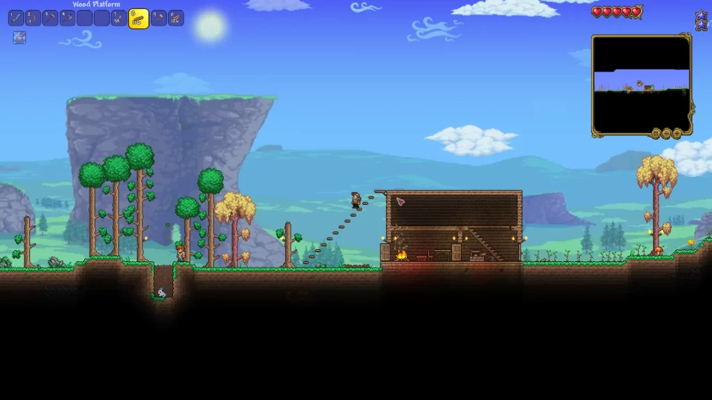 building stairs outside the house in terraria, placing wood platforms