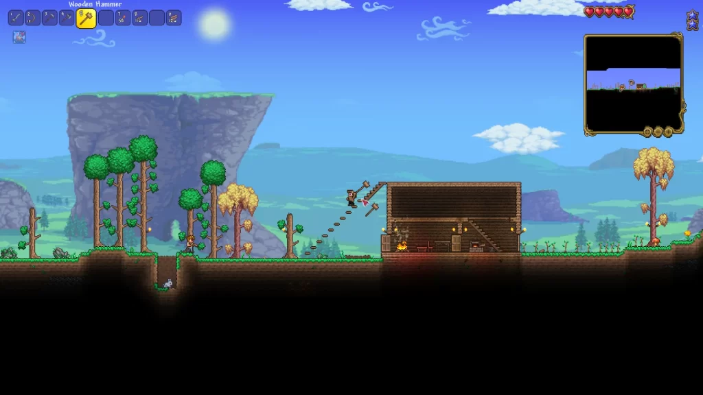 using a wooden hammer to adjust the platforms into a staircase in terraria